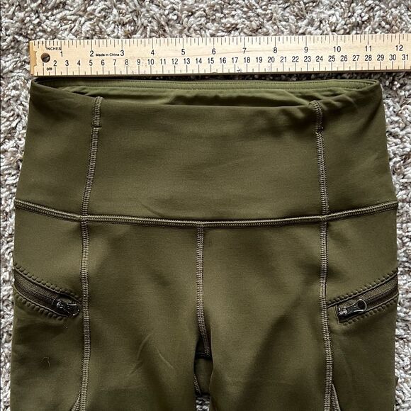 Like New! Lululemon Dark Olive High-Waisted Leggings in Size 4 - Picture 7 of 10